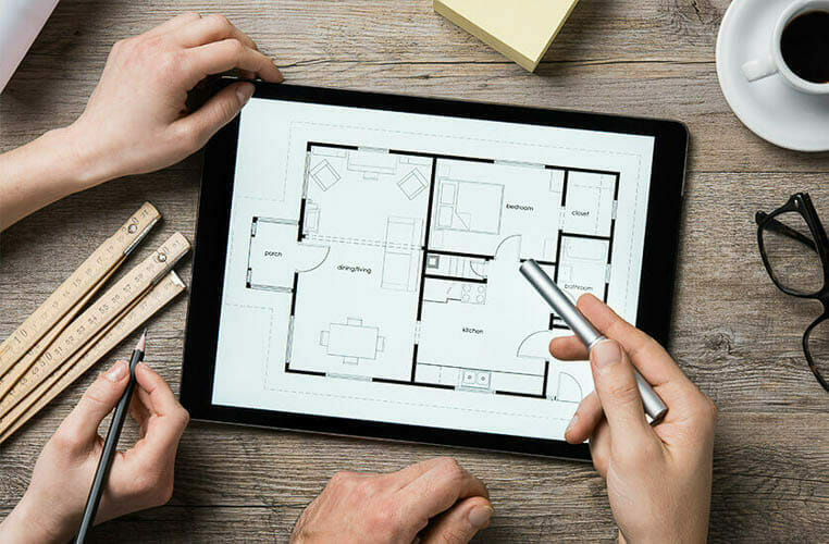 design meeting to floor plan on a tablet
